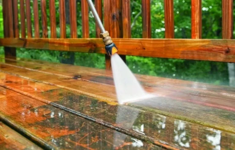 Power washing a wood deck and railing in Cary, NC