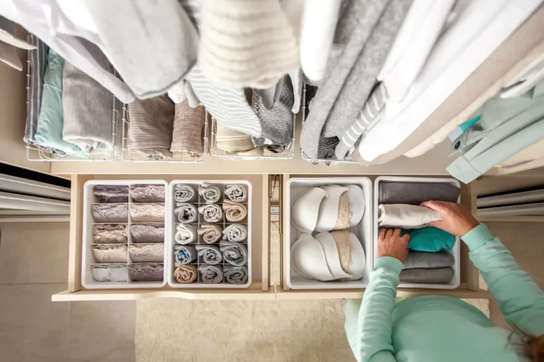 Drawer organized with dividers and folded clothes in Raleigh, NC
