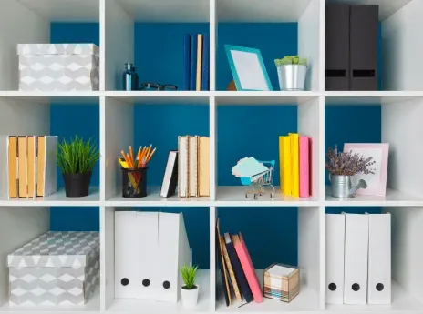 Home office shelves organized with bins and file holders in Apex, NC