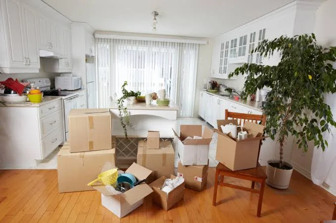 Kitchen packed with boxes before a move-out clean in Morrisville, NC