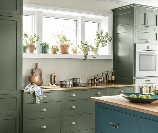 Olive green painted kitchen cabinets in Cary, NC