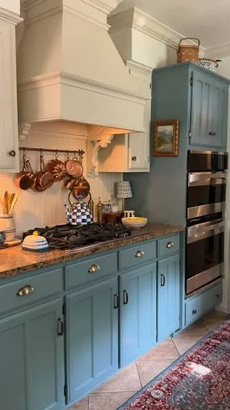 Teal blue painted kitchen cabinets in Morrisville, NC
