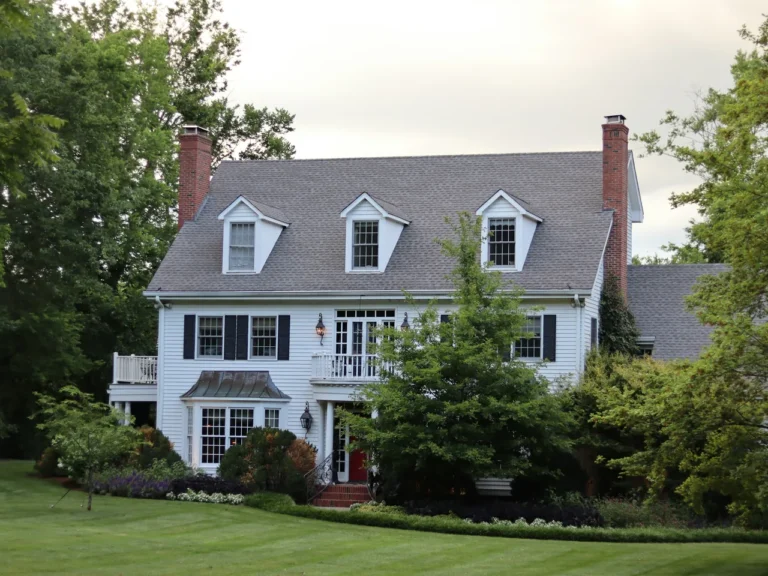 Freshly painted white colonial home exterior in Fuquay-Varina, NC